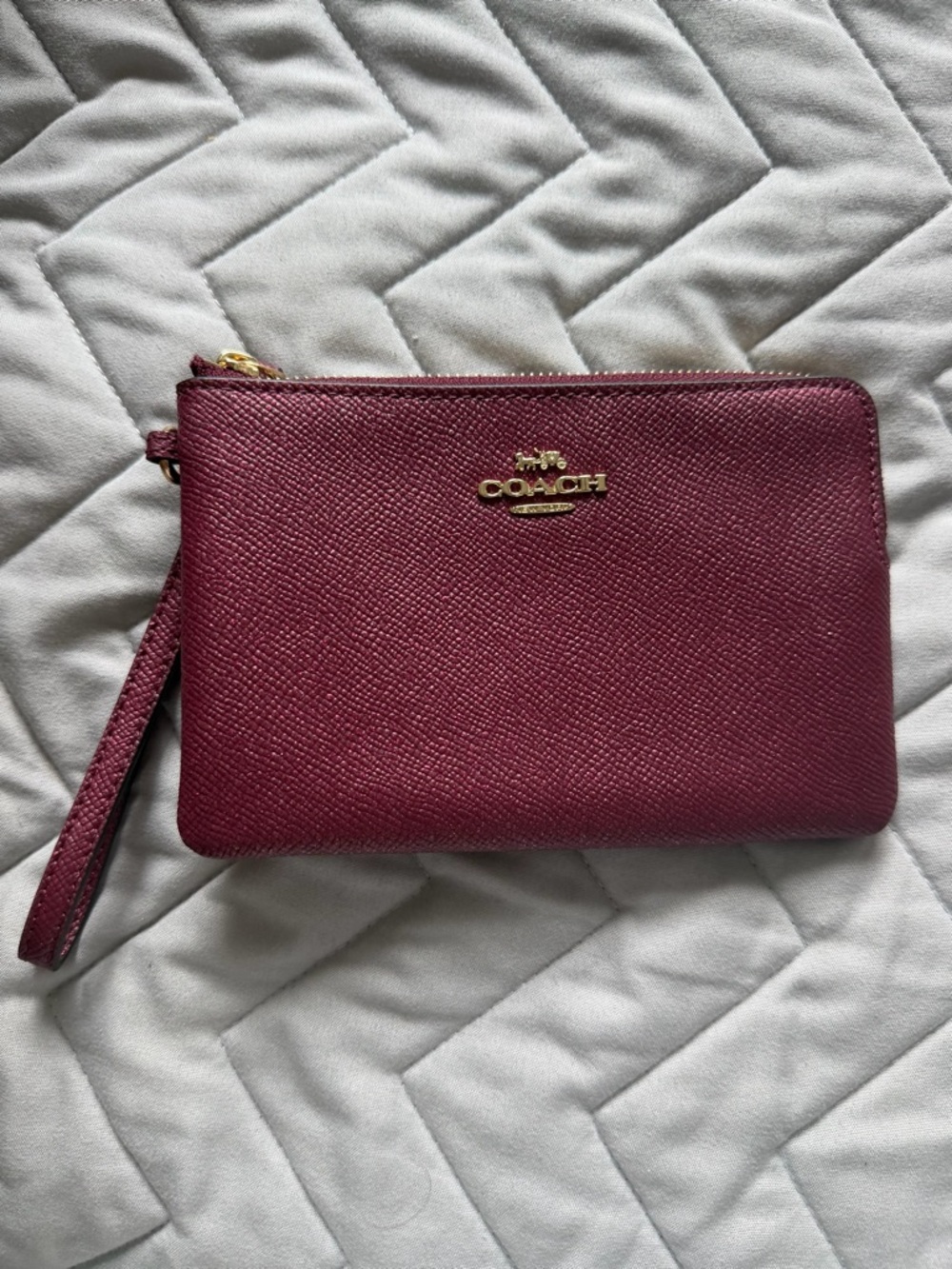 Coach Wristlet in Deep burgundy Wine with Gold Hardware